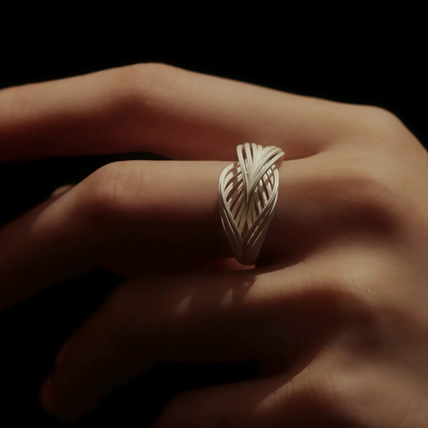 Interwoven Silver Statement Ring – Modern Sculptural Design