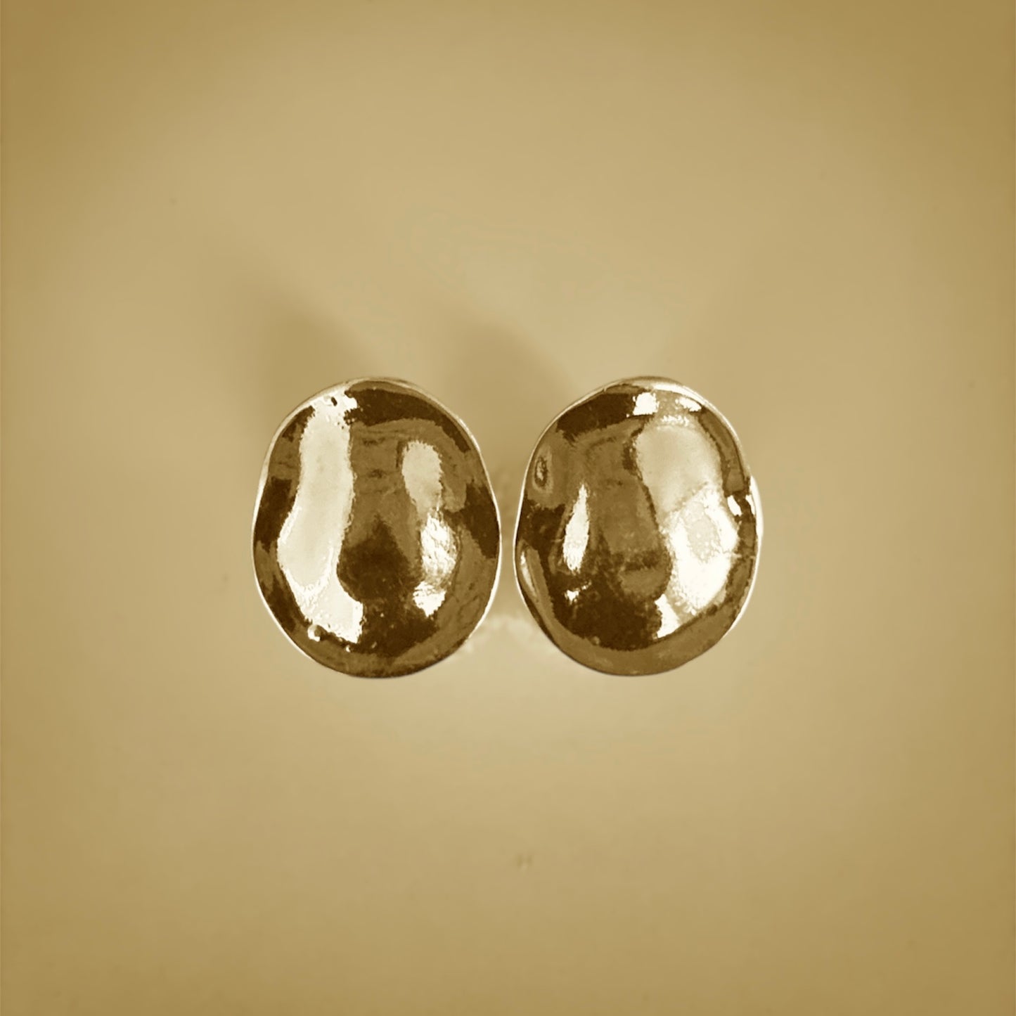 Lunar Melt Earrings – Fluid Elegance in Sculpted Metal