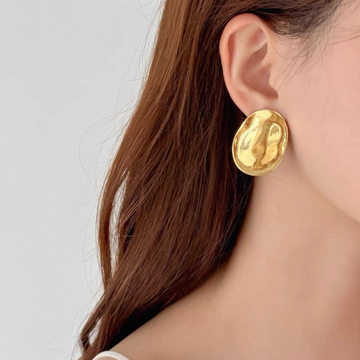 Lunar Melt Earrings – Fluid Elegance in Sculpted Metal