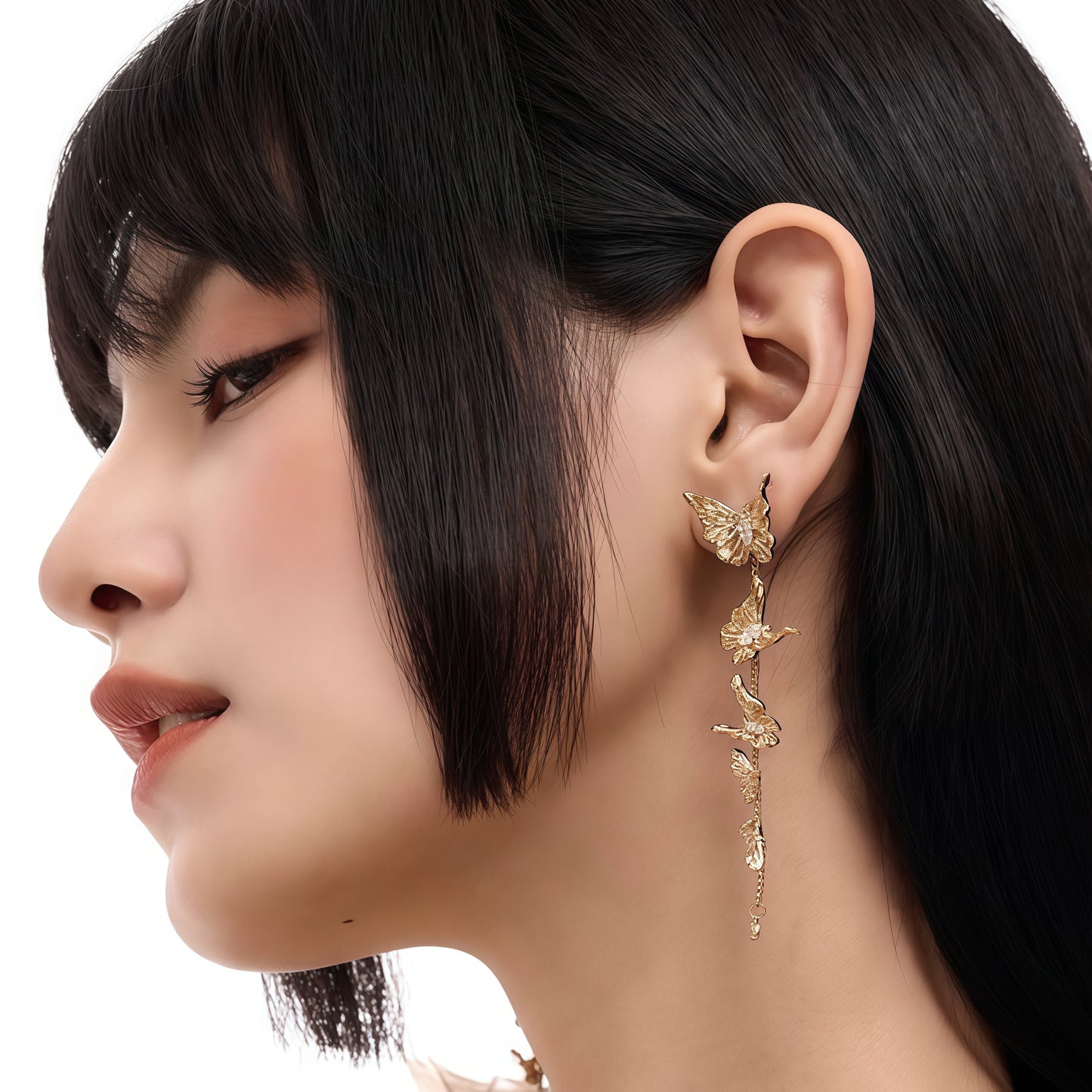 Fluttering Muse Earrings – Golden Symphony of Grace