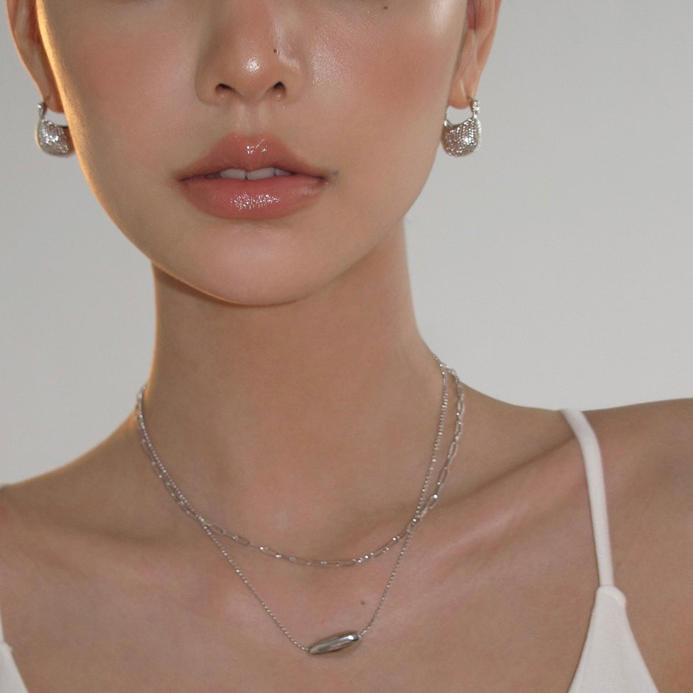 Frontbenchers Earrings – Silver Mini Bag Hoops