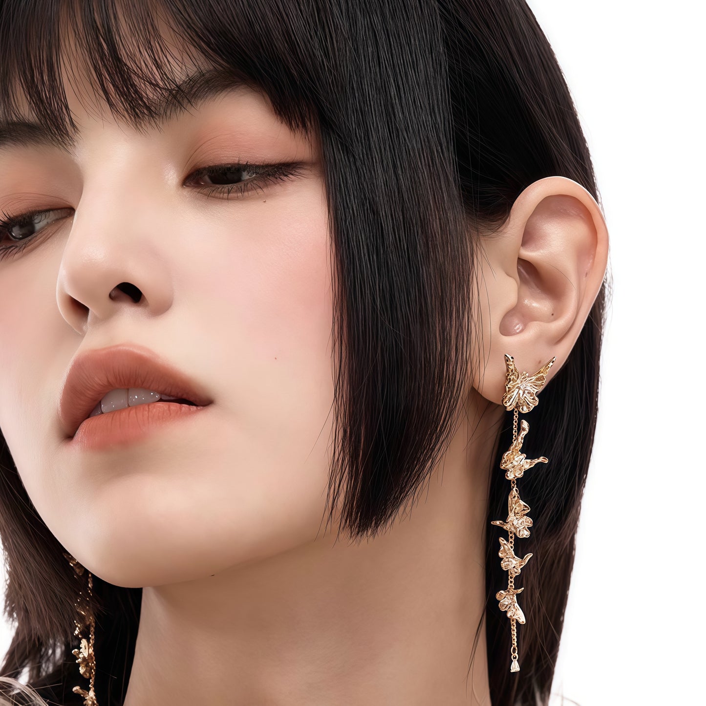 Fluttering Muse Earrings – Golden Symphony of Grace