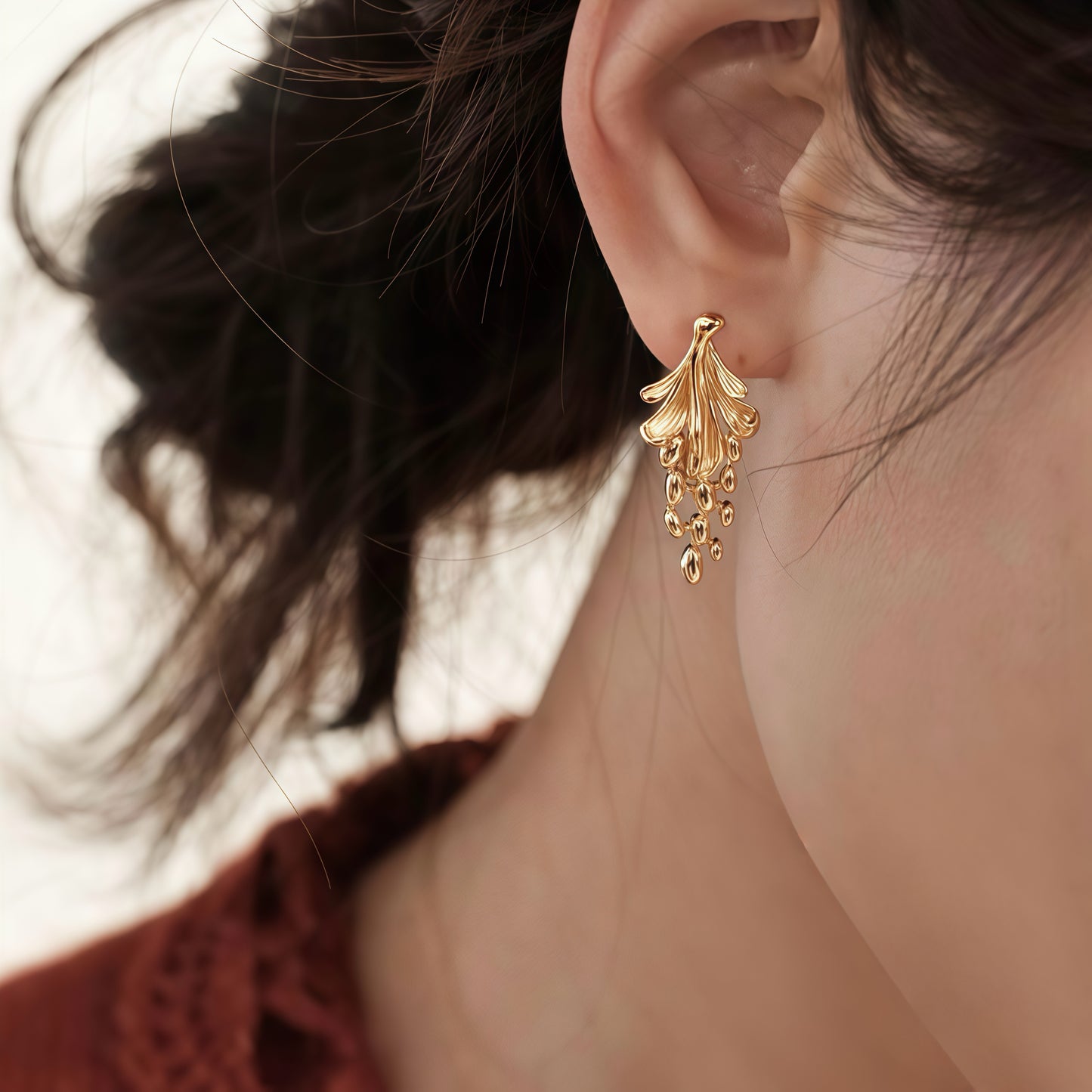 Golden Cascade Earrings – A Symphony of Flow and Light