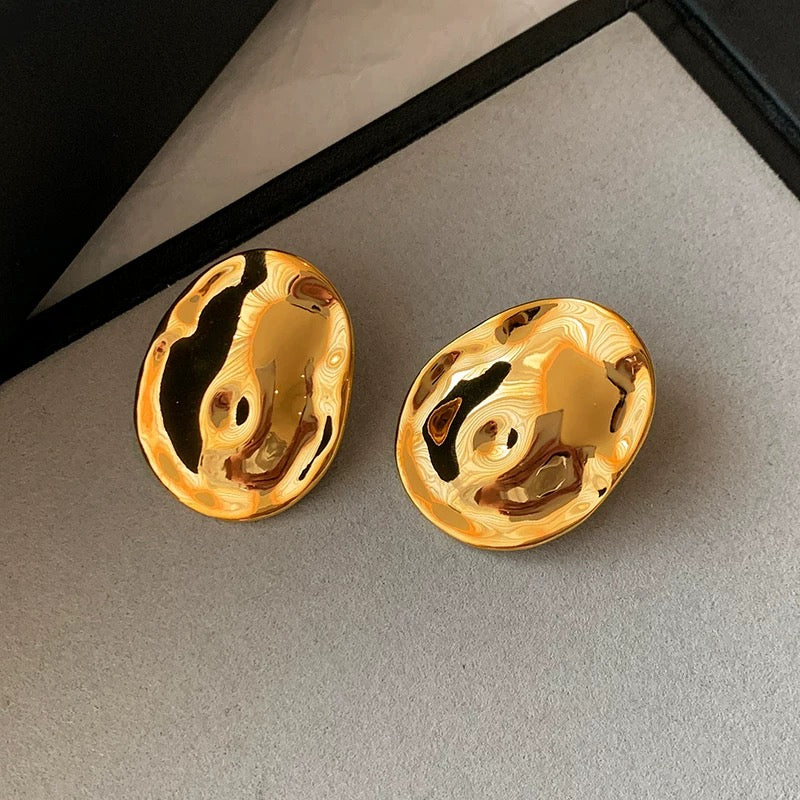 Lunar Melt Earrings – Fluid Elegance in Sculpted Metal