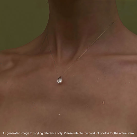 Flytande daggdroppehalsband