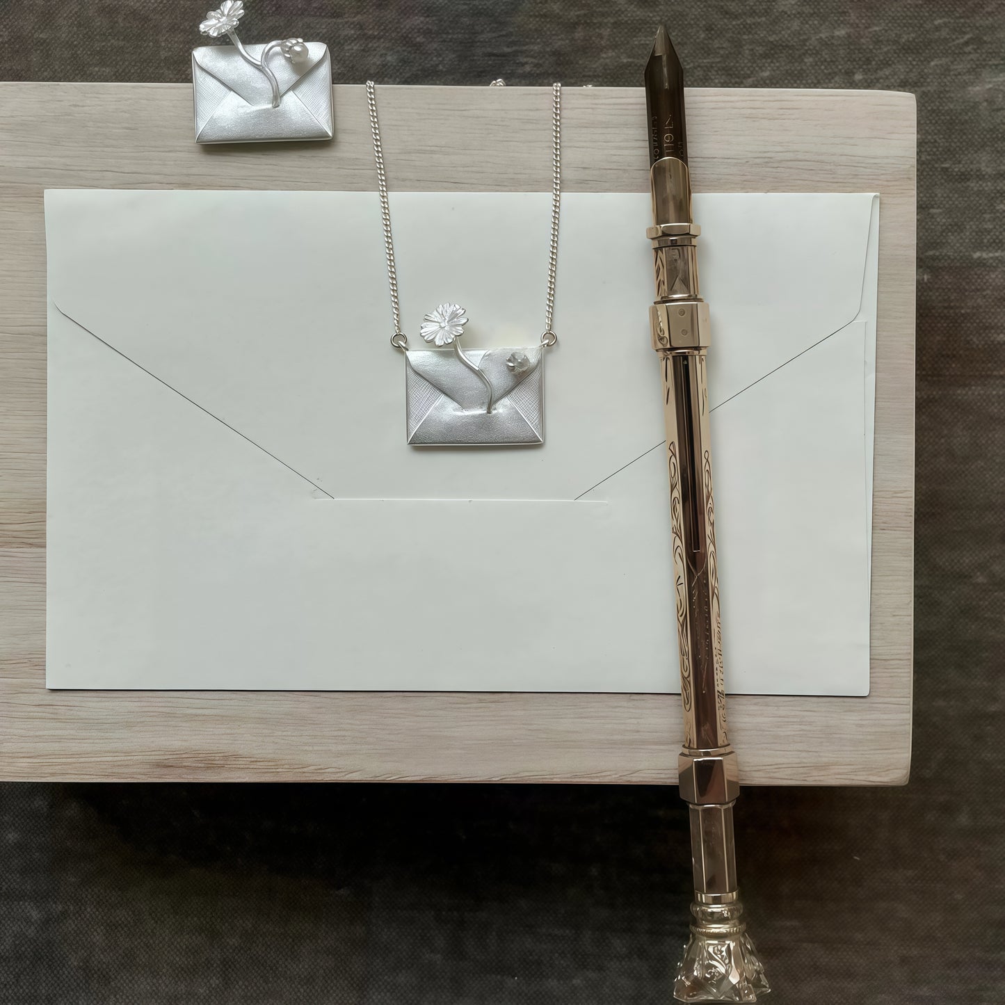 “Letter of Light” Necklace & Brooch