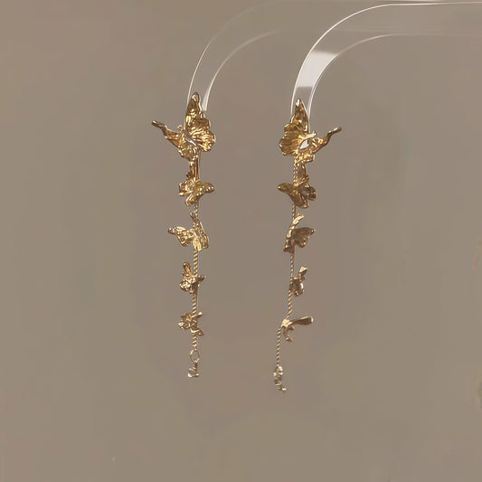 Fluttering Muse Earrings – Golden Symphony of Grace