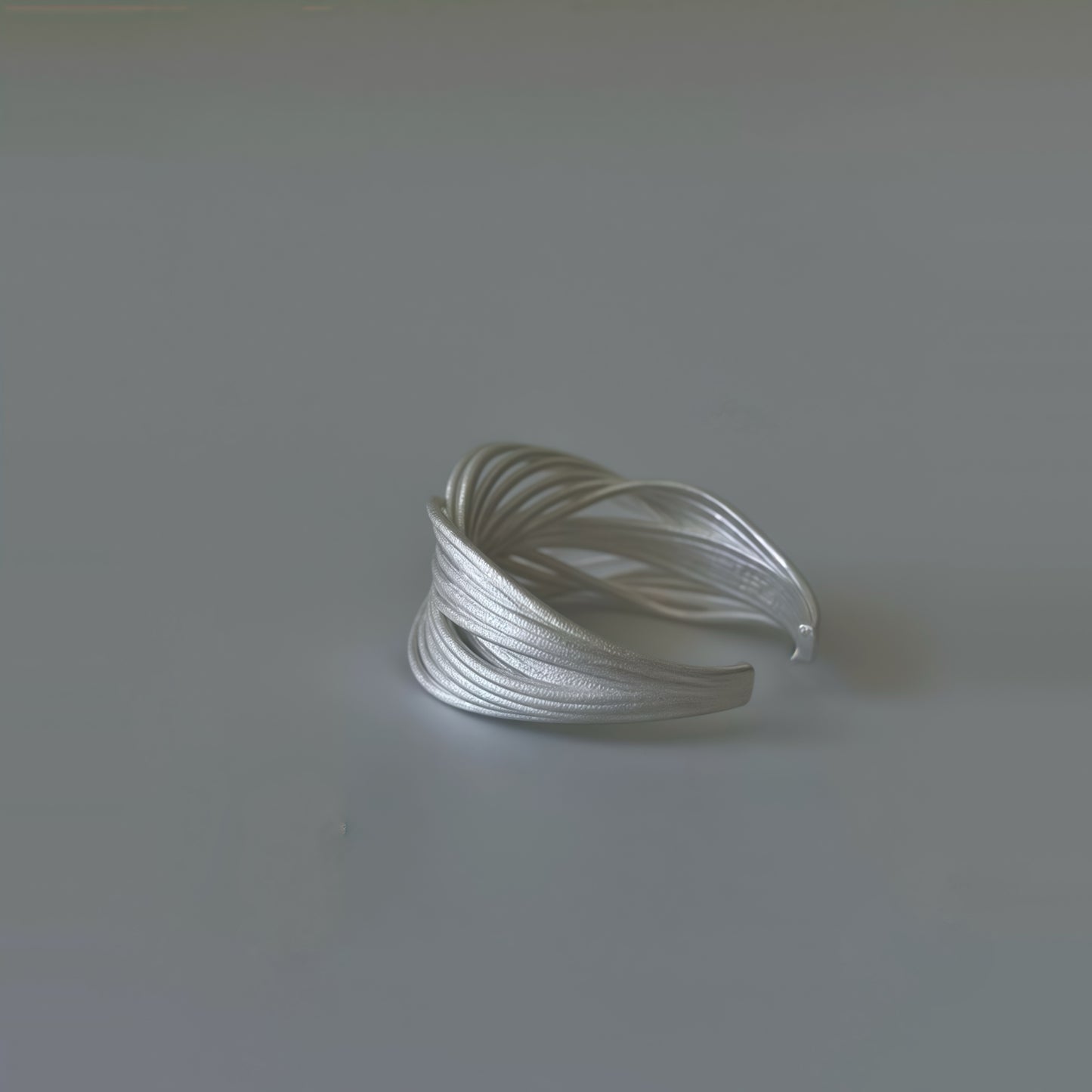Interwoven Silver Statement Ring – Modern Sculptural Design