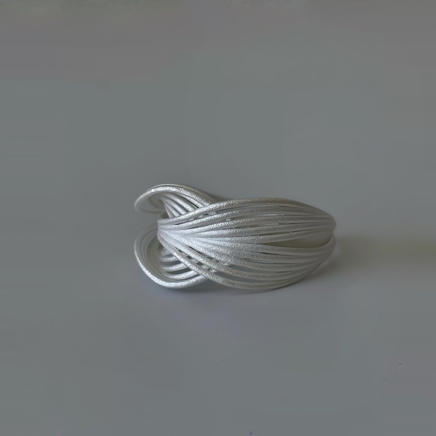 Interwoven Silver Statement Ring – Modern Sculptural Design