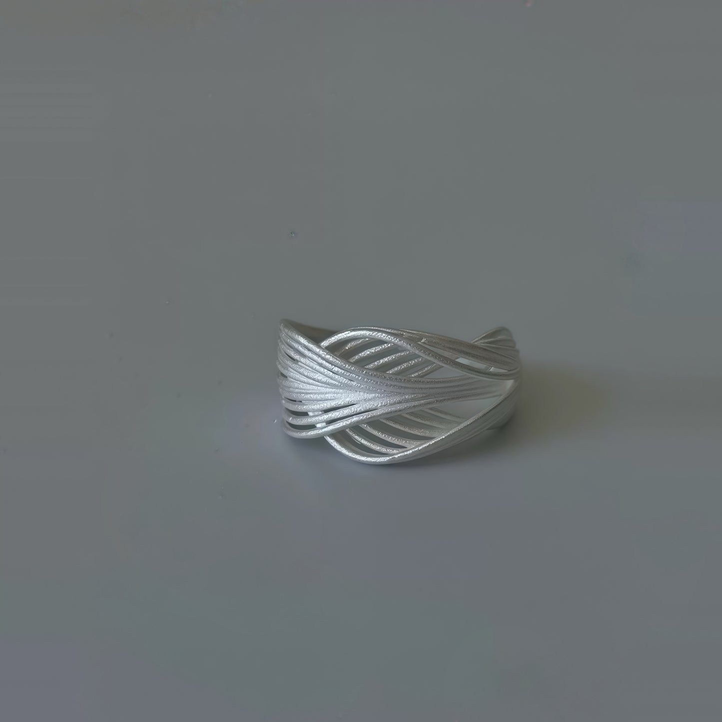 Interwoven Silver Statement Ring – Modern Sculptural Design