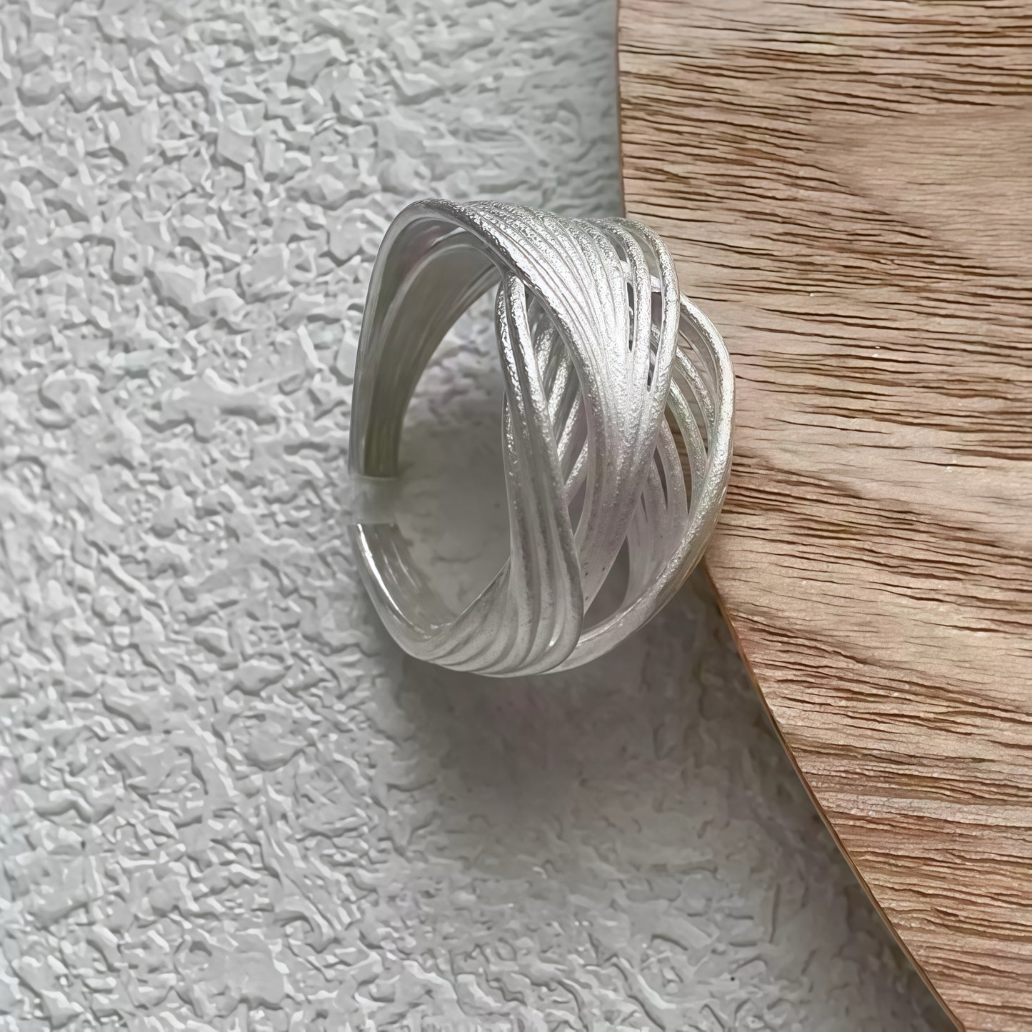 Interwoven Silver Statement Ring – Modern Sculptural Design