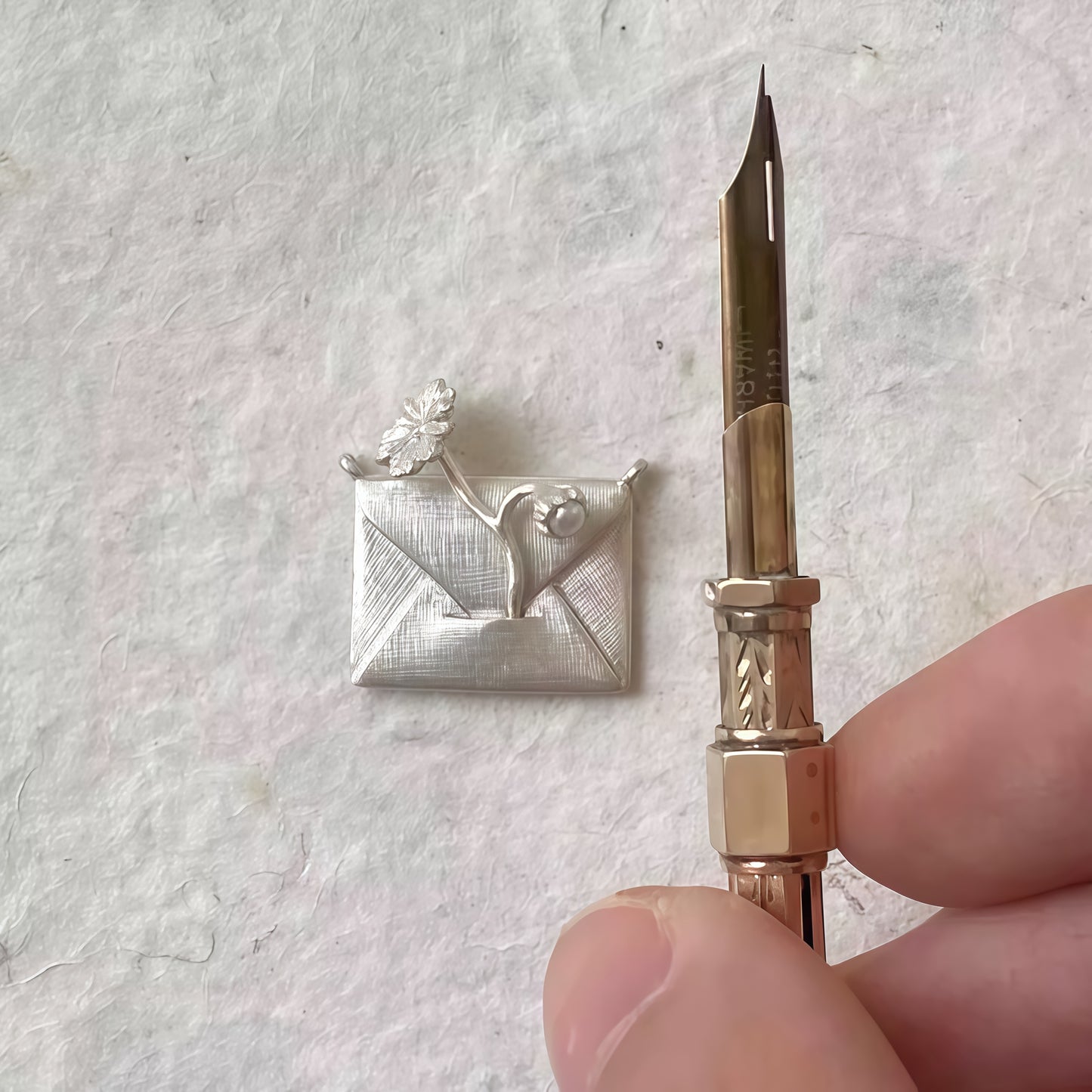 “Letter of Light” Necklace & Brooch